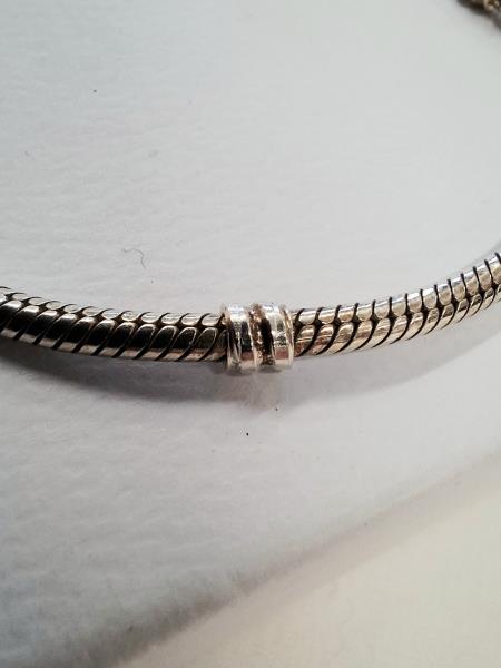 BRACCIALE PANDORA CUORE INFINITO + CHARM