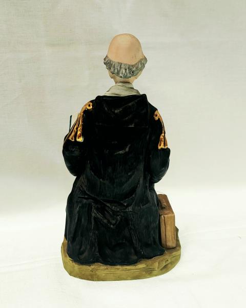 STATUINA UOMO CON LIBRO PUCCI