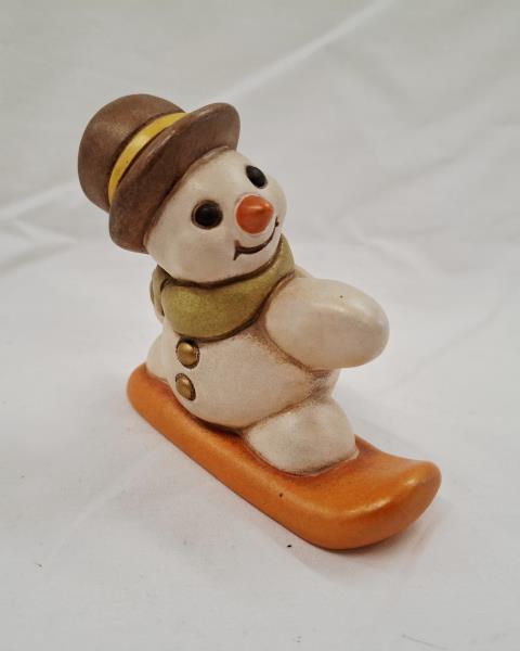 THUN PUPAZZO DI NEVE SU SNOWBOARD